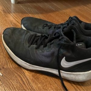 Black Nike shoes. Not that dirty, I will clean them.